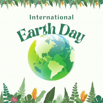 A image of green world with the wording international earth day above it. 